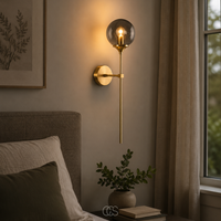 OCS - itoy vintage gouden wandlamp met een glazen bol